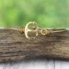 Worn Goldtone Anchor Bangle